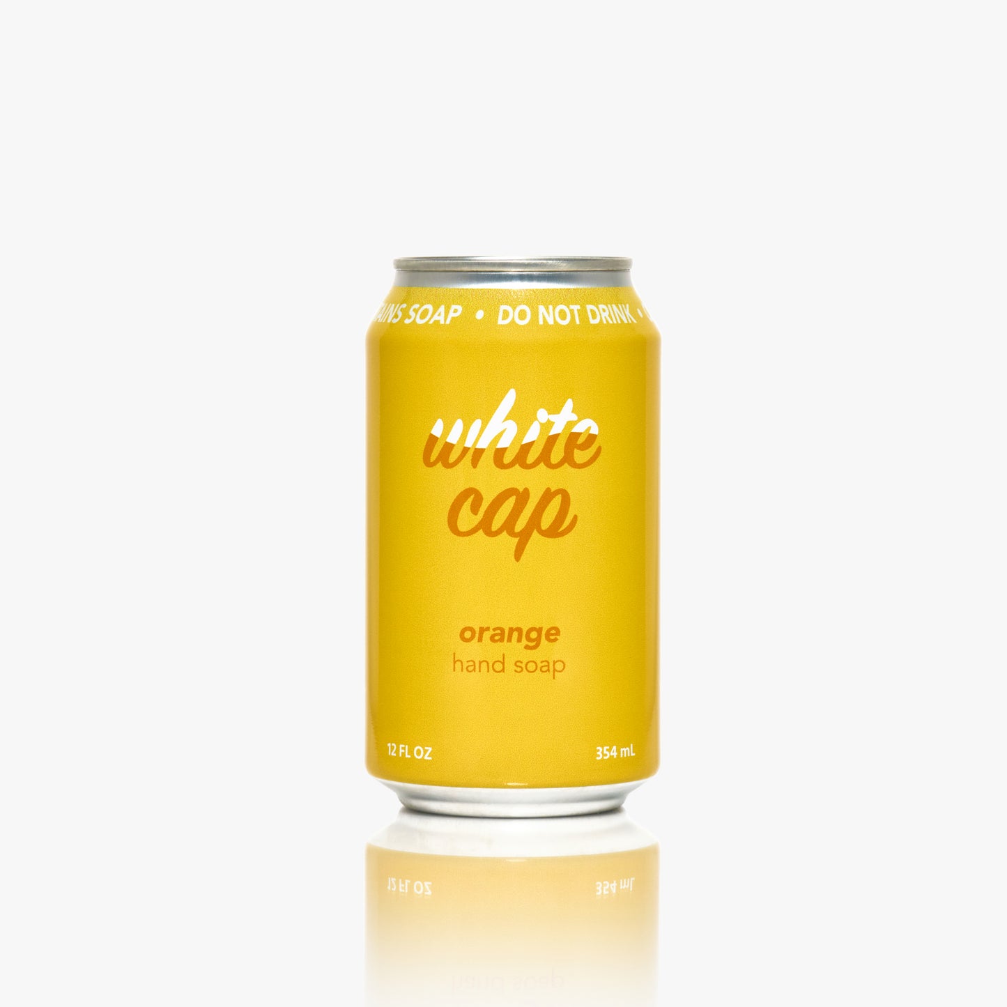 White Cap liquid orange hand soap in recyclable aluminum can.
